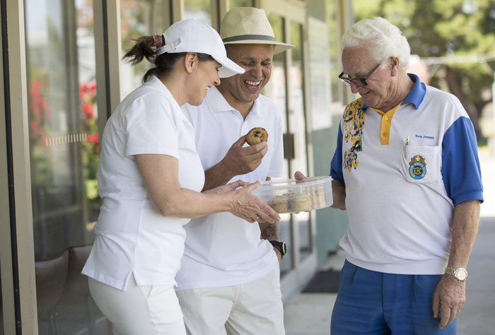 Club members sharing snacks